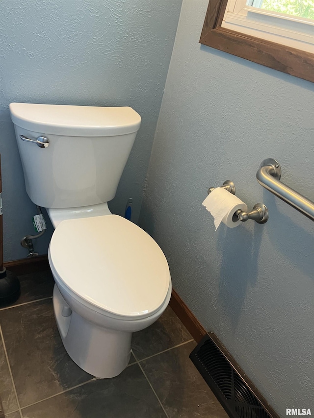 420 E Garfield St, Kewanee, IL 61443 - bathroom with toilet and tile patterned flooring
