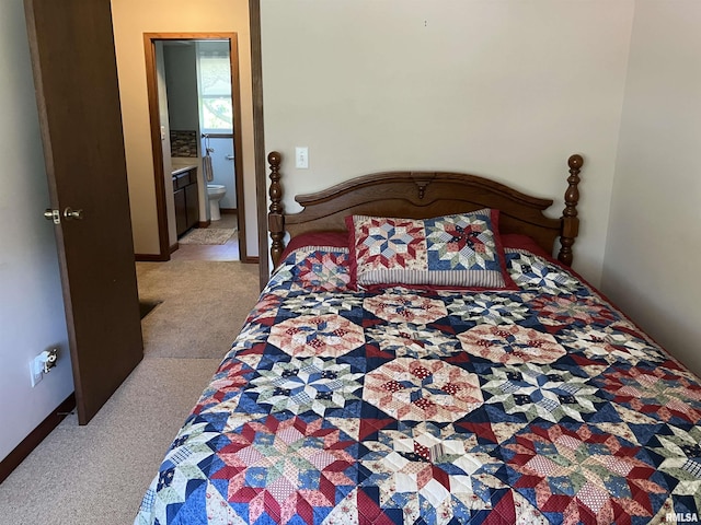 420 E Garfield St, Kewanee, IL 61443 - bedroom with light carpet and ensuite bath