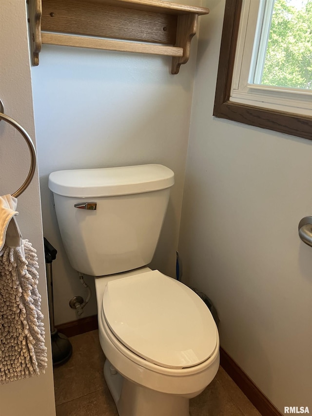420 E Garfield St, Kewanee, IL 61443 - bathroom featuring tile patterned flooring and baseboards