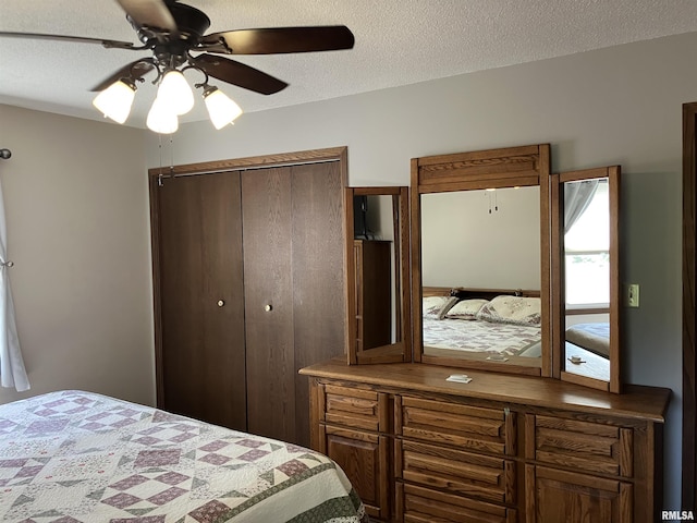 420 E Garfield St, Kewanee, IL 61443 - bedroom with a textured ceiling and ceiling fan