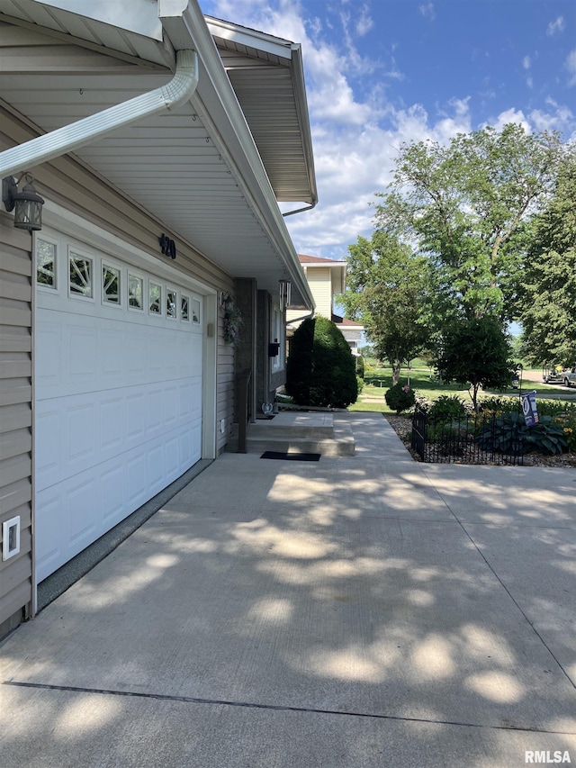 420 E Garfield St, Kewanee, IL 61443 - view of home's exterior featuring driveway and an attached garage