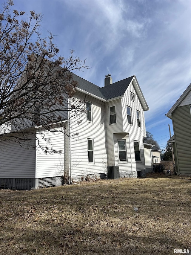 1923 Pershing Ave, Davenport, IA 52803 - rear view of house with a chimney