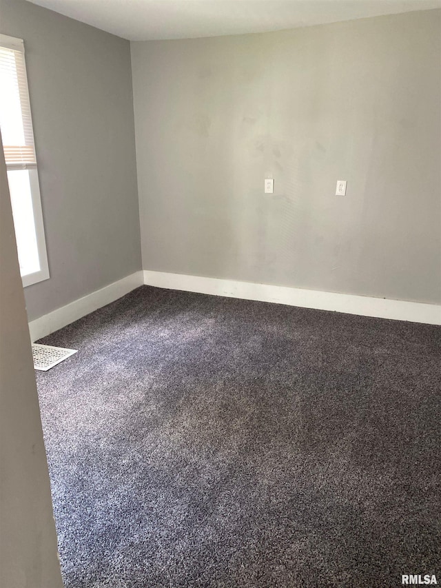1923 Pershing Ave, Davenport, IA 52803 - spare room featuring plenty of natural light and carpet
