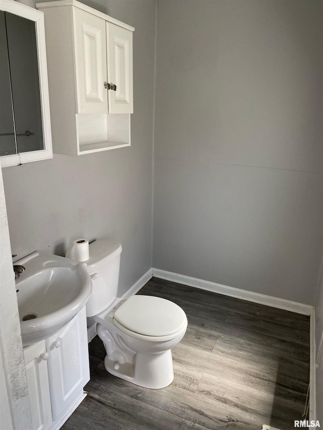 1923 Pershing Ave, Davenport, IA 52803 - bathroom with wood finished floors and vanity