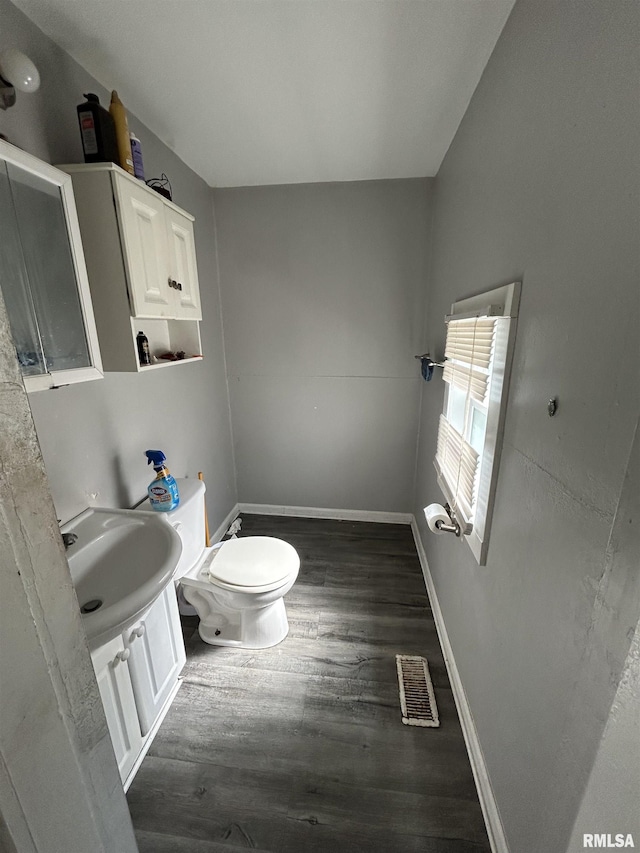 1923 Pershing Ave, Davenport, IA 52803 - half bathroom featuring wood finished floors and vanity