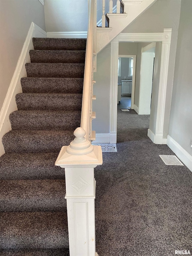 1923 Pershing Ave, Davenport, IA 52803 - stairs featuring baseboards and carpet flooring