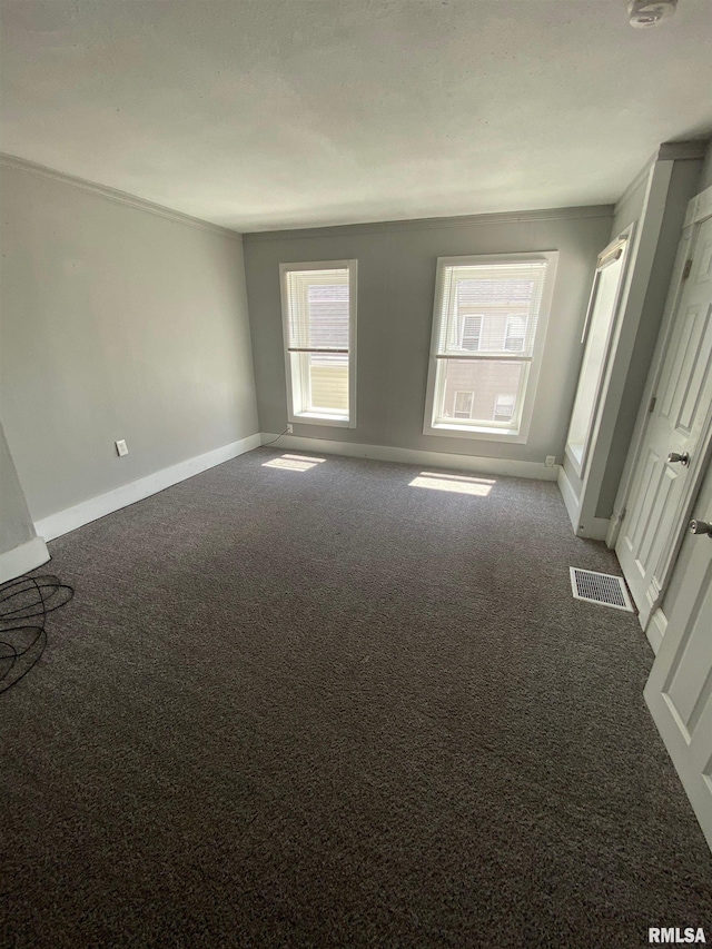 1923 Pershing Ave, Davenport, IA 52803 - carpeted spare room with baseboards