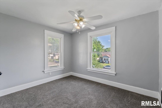 812 W 16th St, Davenport, IA 52804 - unfurnished room featuring dark carpet and a ceiling fan