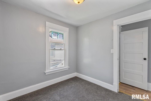 812 W 16th St, Davenport, IA 52804 - empty room with baseboards and carpet floors