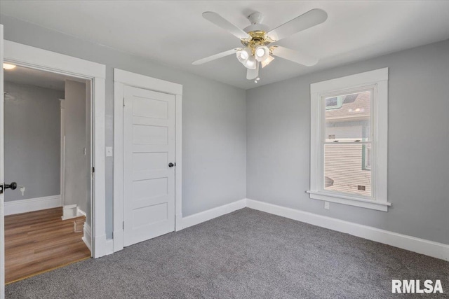 812 W 16th St, Davenport, IA 52804 - carpeted empty room featuring baseboards and ceiling fan