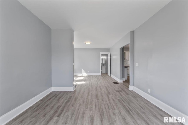 812 W 16th St, Davenport, IA 52804 - unfurnished room featuring wood finished floors and baseboards