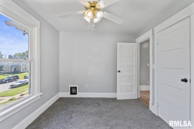 812 W 16th St, Davenport, IA 52804 - unfurnished room featuring carpet floors and ceiling fan