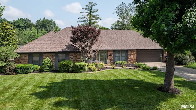 1814 Testa Dr, Marion, IL 62959 - ranch-style house featuring a garage, a front lawn, roof with shingles, and brick siding