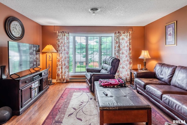 1814 Testa Dr, Marion, IL 62959 - living room with a textured ceiling and light wood-type flooring