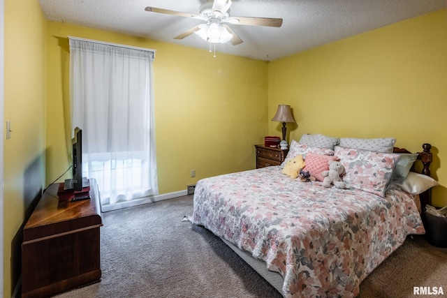 1814 Testa Dr, Marion, IL 62959 - carpeted bedroom featuring a textured ceiling and a ceiling fan