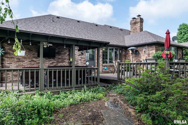 1814 Testa Dr, Marion, IL 62959 - back of property with a shingled roof, a wooden deck, brick siding, a chimney, and ceiling fan