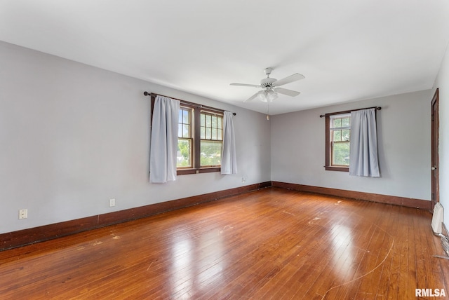 921 45th St, Rock Island, IL 61201 - empty room with ceiling fan and wood-type flooring