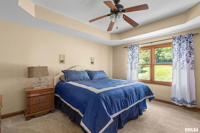 10984 150th St, Davenport, IA 52804 - bedroom with light colored carpet, a textured ceiling, and ceiling fan