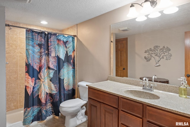 10984 150th St, Davenport, IA 52804 - bathroom featuring vanity and a textured ceiling