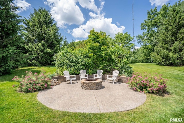 10984 150th St, Davenport, IA 52804 - view of patio with a fire pit