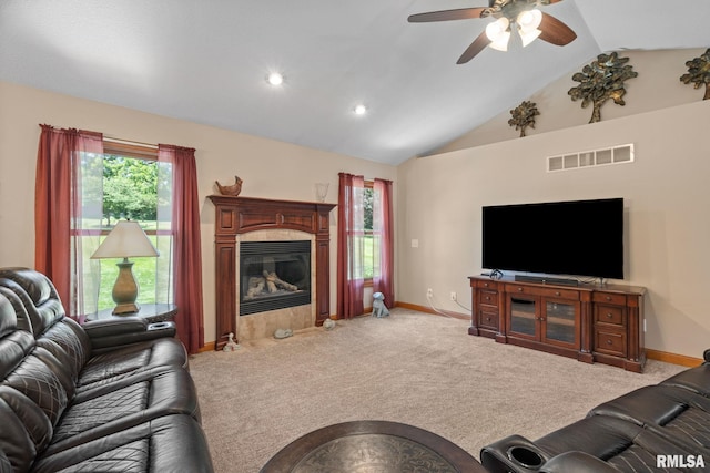 10984 150th St, Davenport, IA 52804 - living room with a ceiling fan, lofted ceiling, a premium fireplace, light colored carpet, and recessed lighting