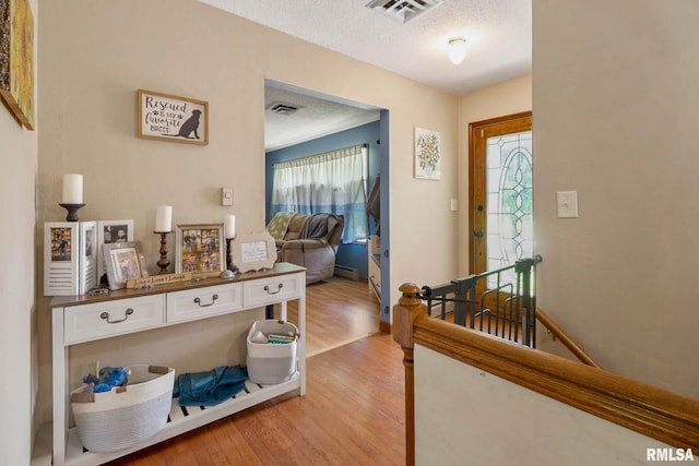 1406 Golf Course Rd, Marion, IL 62959 - entryway with light wood-type flooring and a textured ceiling
