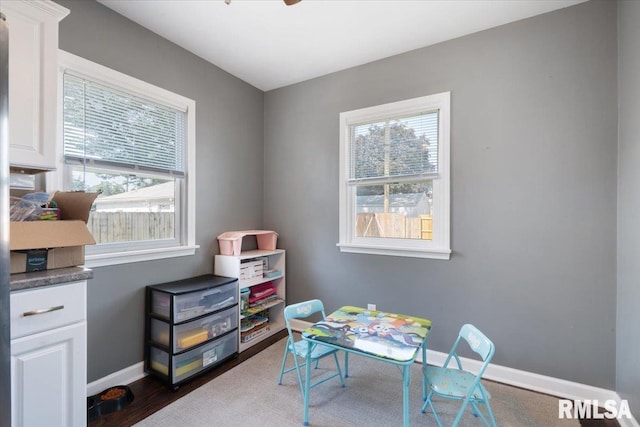 2506 N Howell St, Davenport, IA 52804 - recreation room with plenty of natural light and dark wood-type flooring