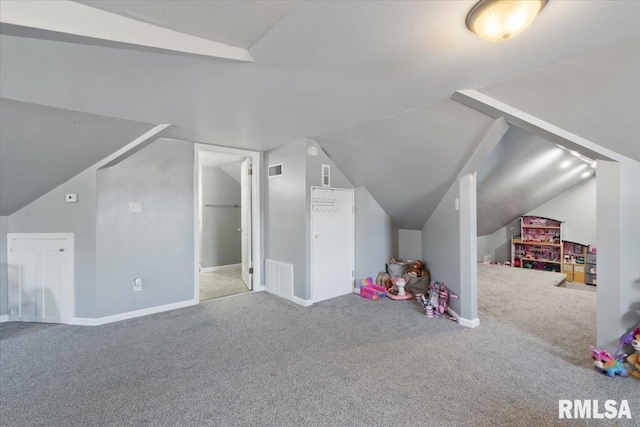2506 N Howell St, Davenport, IA 52804 - bonus room featuring carpet and vaulted ceiling