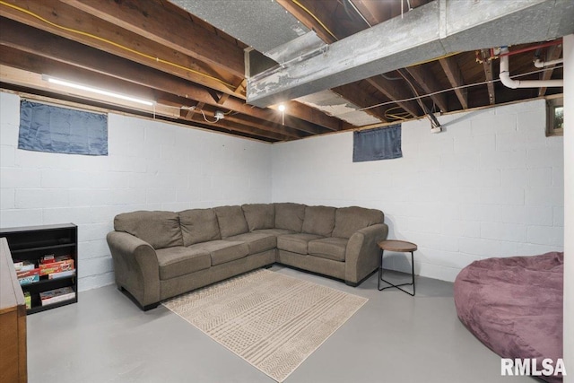 2506 N Howell St, Davenport, IA 52804 - living room featuring concrete flooring