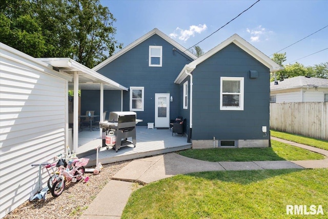2506 N Howell St, Davenport, IA 52804 - back of property featuring a wooden deck