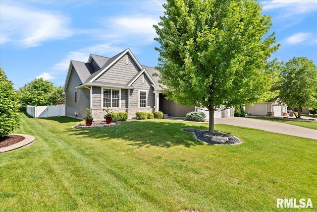 6691 Spring Creek Dr, Bettendorf, IA 52722 - craftsman house featuring driveway, stone siding, and a garage