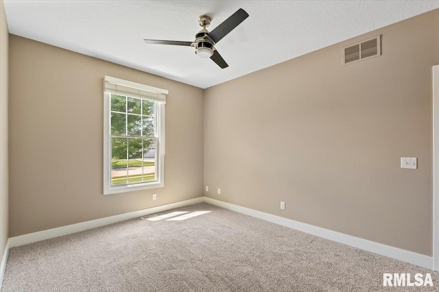6691 Spring Creek Dr, Bettendorf, IA 52722 - unfurnished room with ceiling fan and carpet floors
