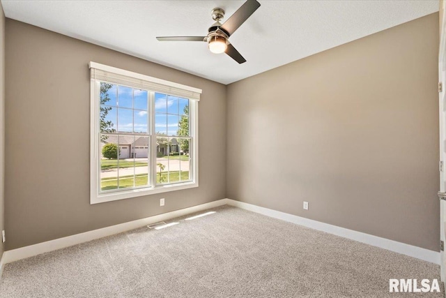 6691 Spring Creek Dr, Bettendorf, IA 52722 - carpeted spare room featuring ceiling fan and baseboards