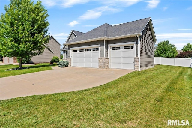 6691 Spring Creek Dr, Bettendorf, IA 52722 - view of home's exterior with stone siding and a garage