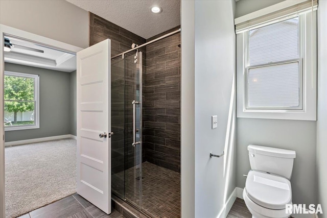 6691 Spring Creek Dr, Bettendorf, IA 52722 - bathroom featuring a stall shower and recessed lighting