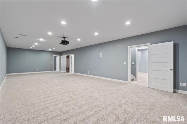 6691 Spring Creek Dr, Bettendorf, IA 52722 - spare room featuring carpet floors and recessed lighting