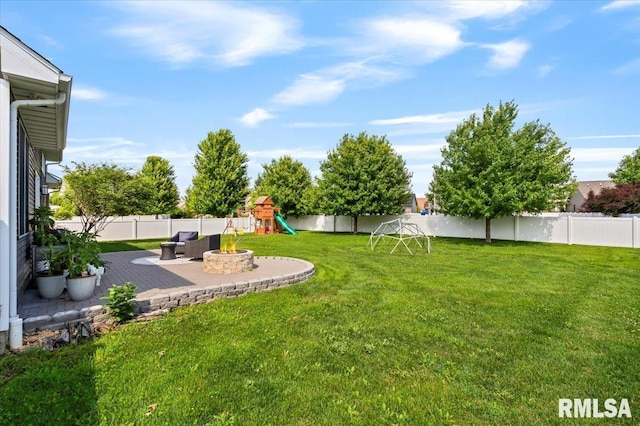 6691 Spring Creek Dr, Bettendorf, IA 52722 - fenced backyard with a playground and a patio area