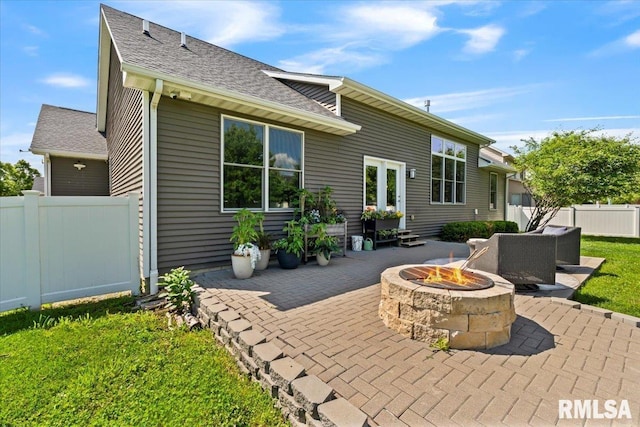 6691 Spring Creek Dr, Bettendorf, IA 52722 - view of patio / terrace with an outdoor fire pit