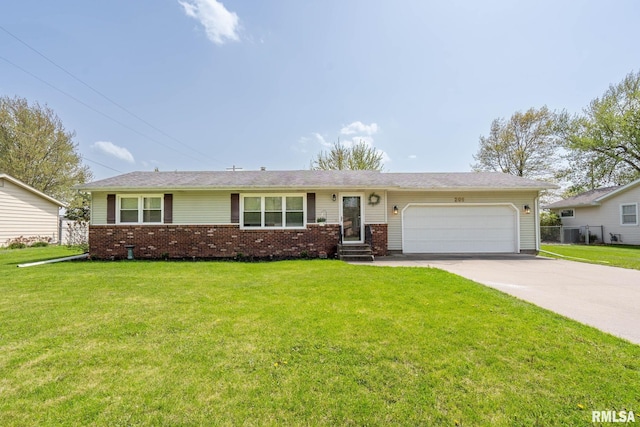 209 Hilltop St, Colona, IL 61241 - ranch-style home featuring brick siding, an attached garage, and driveway