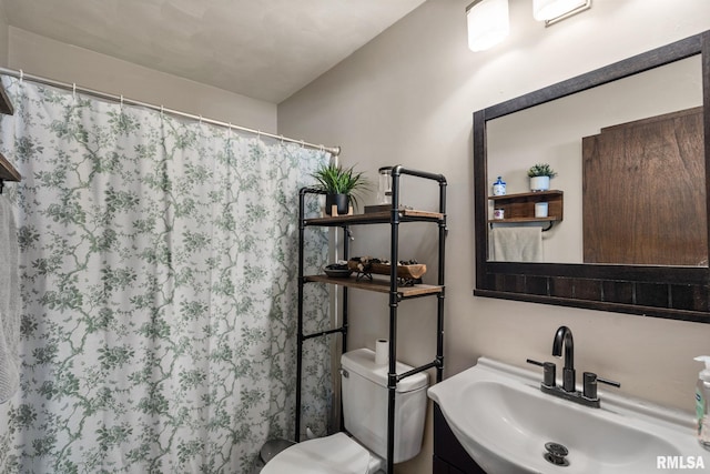 209 Hilltop St, Colona, IL 61241 - bathroom with a sink and curtained shower