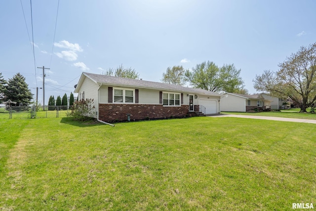 209 Hilltop St, Colona, IL 61241 - ranch-style home with an attached garage, brick siding, and concrete driveway