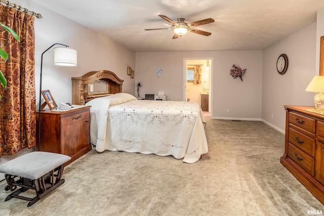 2305 Weaver Rd, Herrin, IL 62948 - bedroom featuring light colored carpet, connected bathroom, and ceiling fan