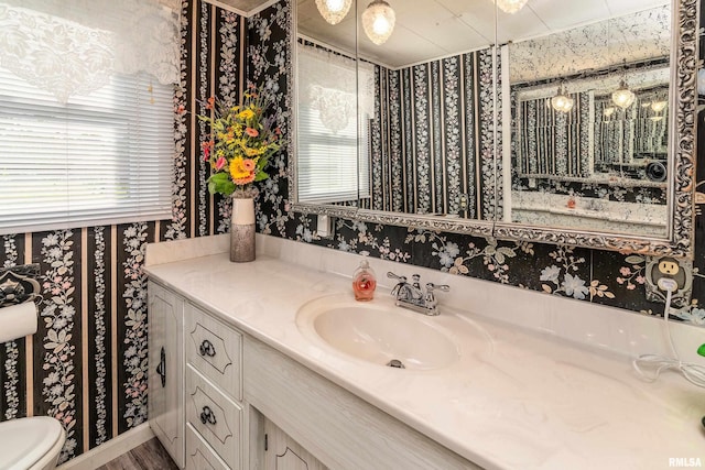2305 Weaver Rd, Herrin, IL 62948 - bathroom with wallpapered walls and vanity