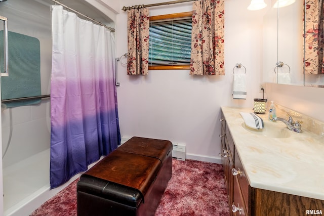 2305 Weaver Rd, Herrin, IL 62948 - full bathroom featuring vanity, baseboard heating, and a shower with shower curtain