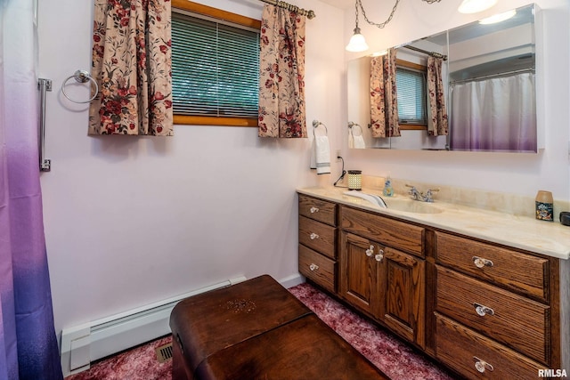 2305 Weaver Rd, Herrin, IL 62948 - bathroom with vanity and a baseboard heating unit