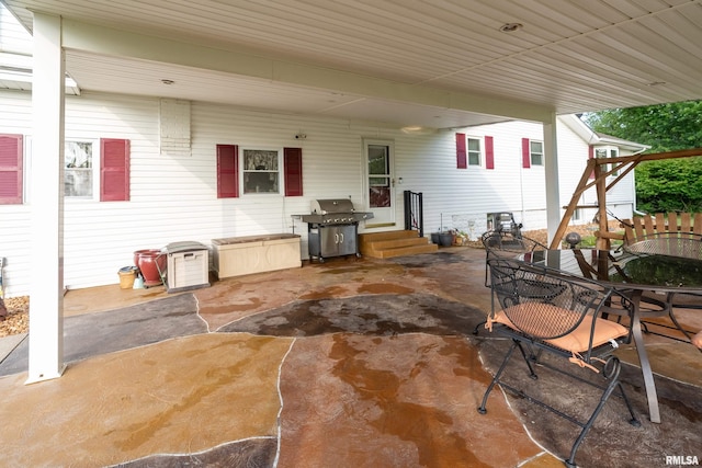 2305 Weaver Rd, Herrin, IL 62948 - view of patio with a grill, outdoor dining area, and entry steps