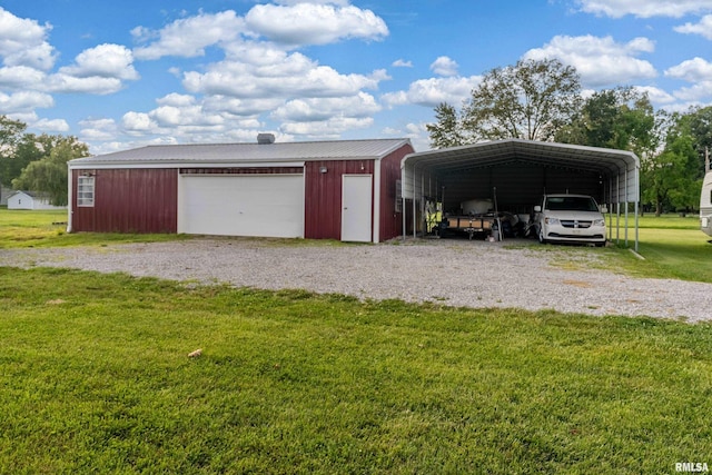 2305 Weaver Rd, Herrin, IL 62948 - detached garage featuring gravel driveway