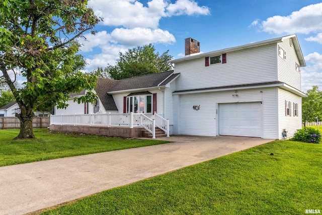 2305 Weaver Rd, Herrin, IL 62948 - view of front of home featuring a chimney, an attached garage, driveway, and a deck