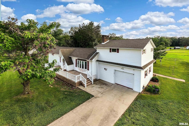 2305 Weaver Rd, Herrin, IL 62948 - traditional-style home with concrete driveway, a front yard, a chimney, an attached garage, and a shingled roof