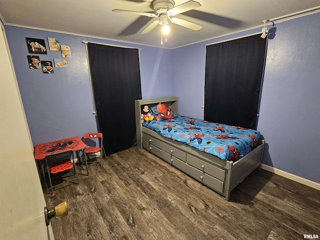 2409 9th St, Silvis, IL 61282 - bedroom with wood finished floors, crown molding, and a ceiling fan